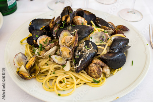 Spaghetti with mussels, clams and garlic at a restaurant in the Trastevere district in Rome
