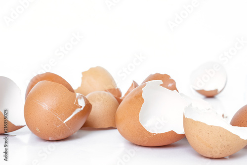 egg shell broken crack pile food on white background