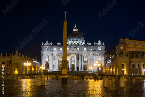 View of St Peter's Cathedral and basilica from St Peter's square at night