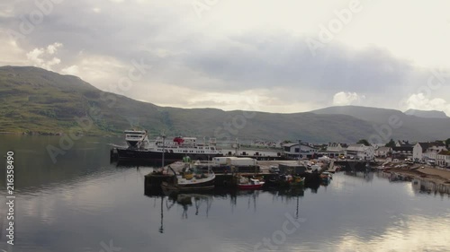 CalMac Ferries - Caledonian MacBrayne MV Loch Seaforth arriving into Ullapool harbour with cruise ship the Hebridean Princess alongside. photo