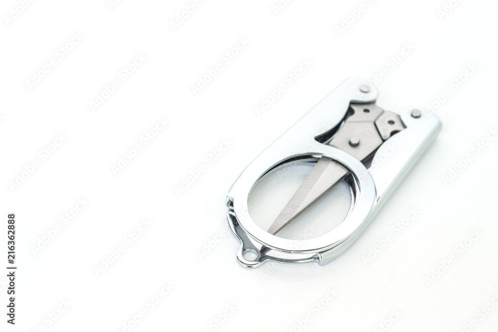 silver scissors cutting on white background silver scissors cutting on white background