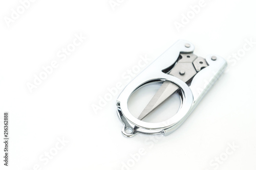 silver scissors cutting on white background