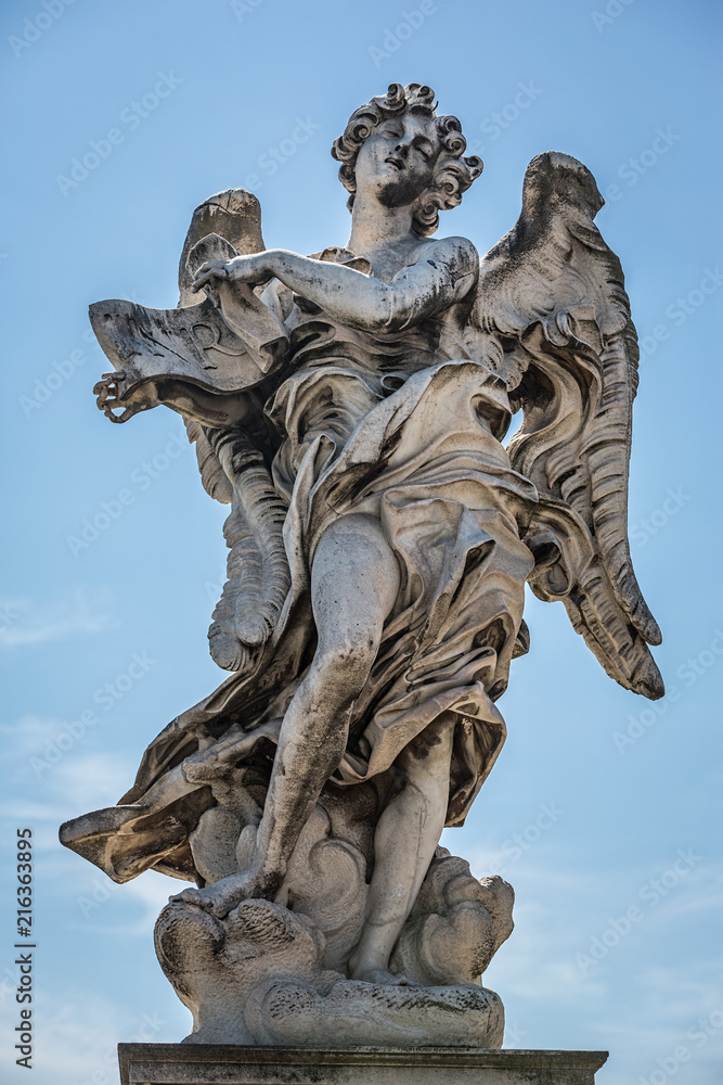 Angel with the superscription sculpture by Gian Lorenzo Bernini on the Pont Sant'Angelo bridge in Rome Angel with the superscription sculpture by Gian Lorenzo Bernini on the Pont Sant'Angelo bridge in Rome