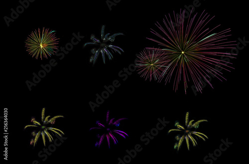 multicolored, clear fireworks on a black background isolated