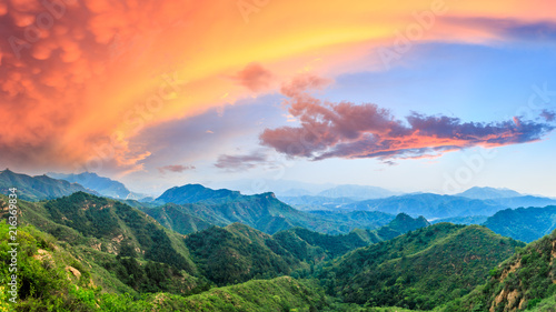 Green mountains and beautiful sky at sunset