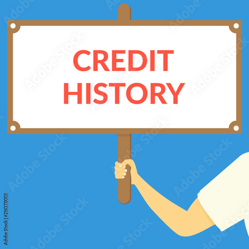 CREDIT HISTORY. Hand holding wooden sign