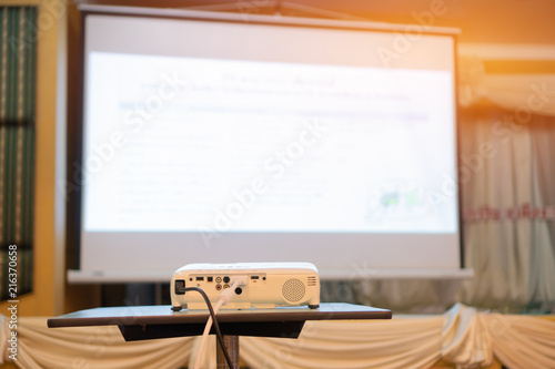 Blank projector with white screen for presentation in conference or meeting room, Business meeting and education in teaching classroom concept