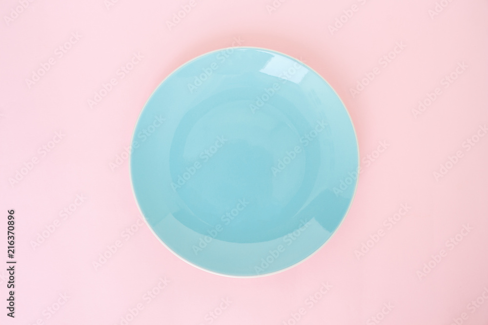 blue plate empty on pink rose quartz and serenity background blue plate empty on pink rose quartz and serenity background