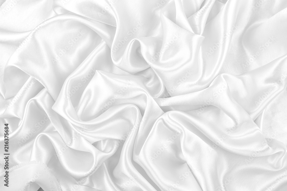 Obraz premium Luxurious of smooth white silk or satin fabric texture background