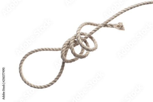 The process of tying a rope knot for a noose, isolated on white background