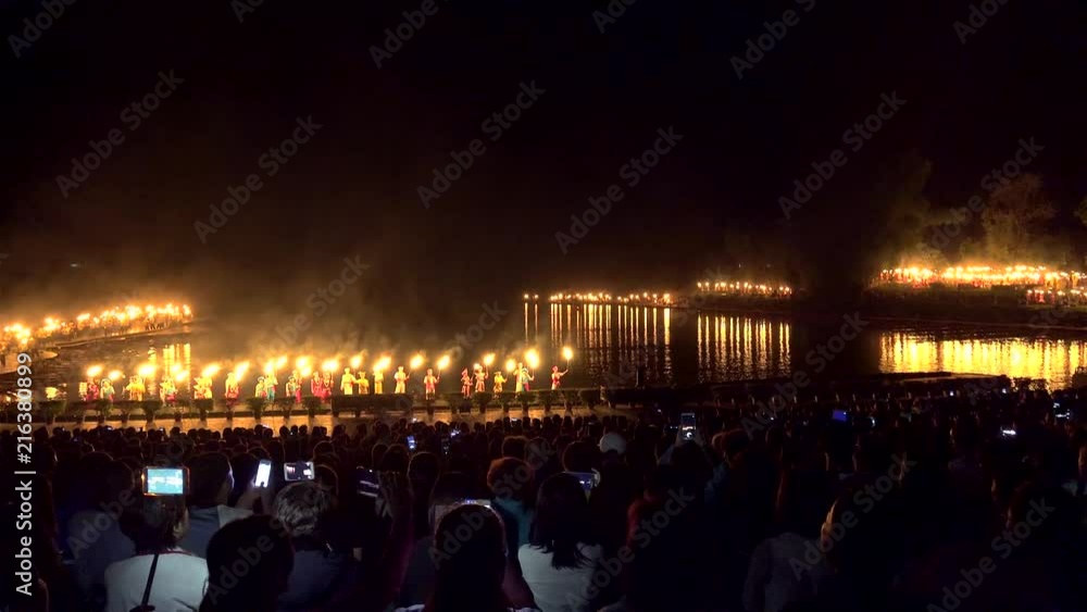 Spectators in the  world largest natural theater with  'Impression Sanjie Liu' show. Yangshuo, Guilin, Guangxi Zhuang, China 