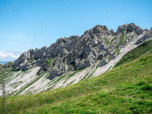steep mountain cliffs during summer sunny day in the swiss alps