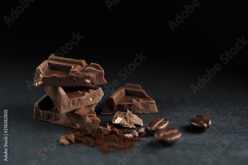 Chocolate pieces on dark background