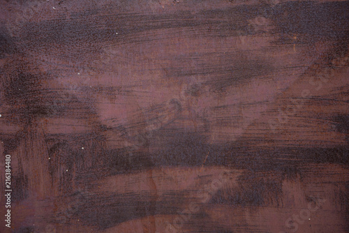 Old rusted red metal background, texture or pattern. Abstract wallpaper.