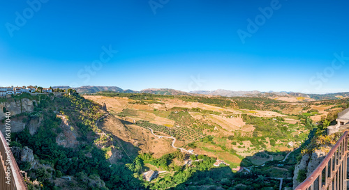 Views to the valley of Serrania de Ronda Mountains from the viewpoint of the gardens of Tajo de Ronda in Ronda, Spain