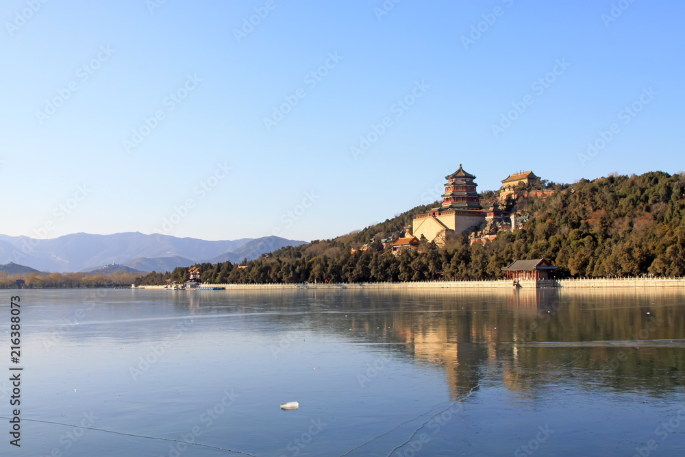 Tower of Buddhist incense and frozen Kunming lake