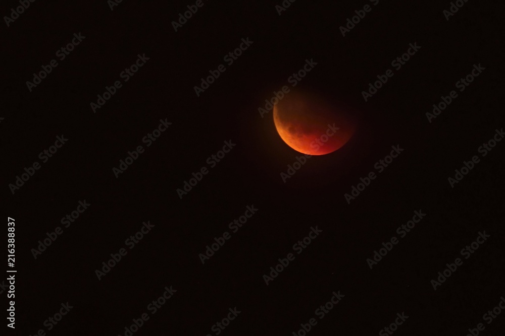 Eclipse of the moon. Photo of the night sky during the eclipse of the month July 27, 2018 Eclipse of the moon. Photo of the night sky during the eclipse of the month July 27, 2018