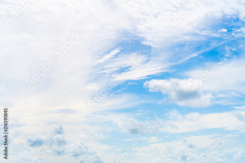 Clear blue sky on sunny day with sparse clouds  abstract background. Nature  air travel  weather forecast  cloudscape  or freedom concept