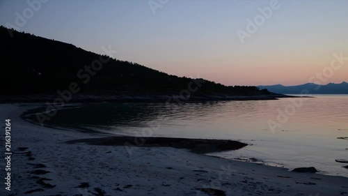 Timelapse of the tide coming in in a Norwegian beach photo