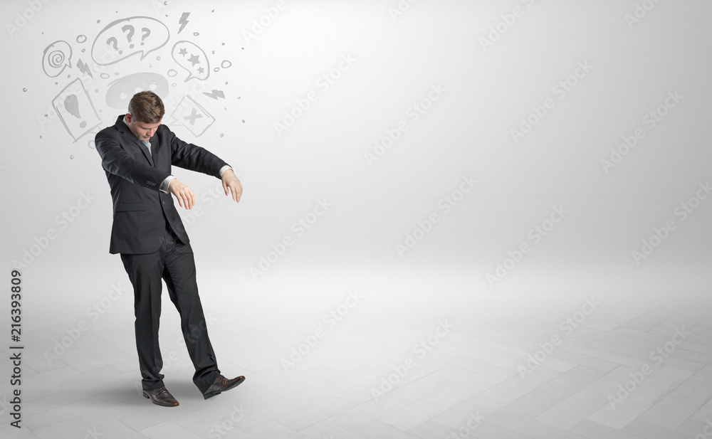 Obraz premium Sleeping sickness young businessman with questions, staffs in his head