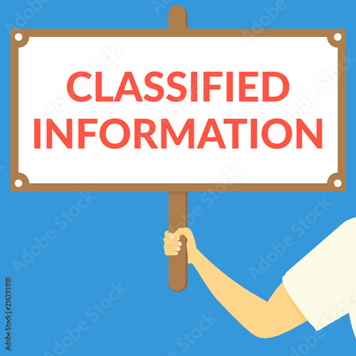 CLASSIFIED INFORMATION. Hand holding wooden sign