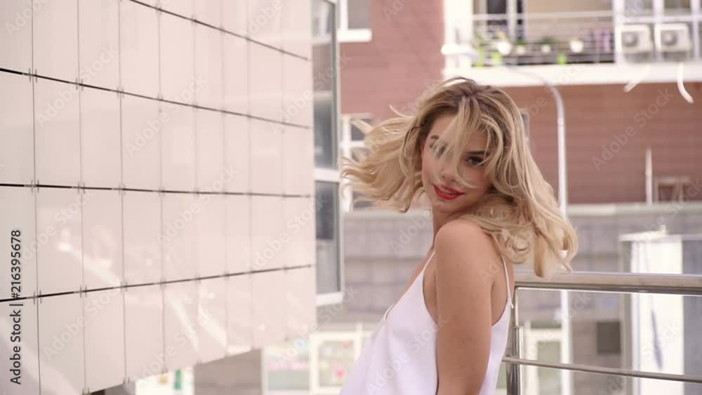 Portrait of a beautiful sexy smiling happy girl with big full lips with blond hair Portrait of a beautiful sexy smiling happy girl with big full lips with blond hair