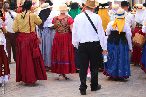 Locals in traditional Canarian dresses  at a public festival in San Sebastian de la Gomera photo