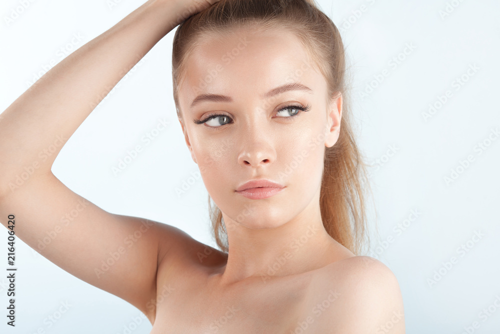 Young beautiful girl with clean perfect skin close-up Young beautiful girl with clean perfect skin close-up
