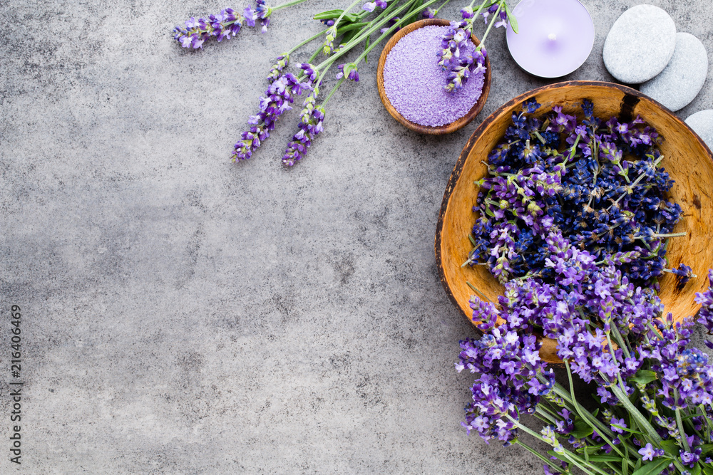 Essential lavender salt with flowers top view. Essential lavender salt with flowers top view.