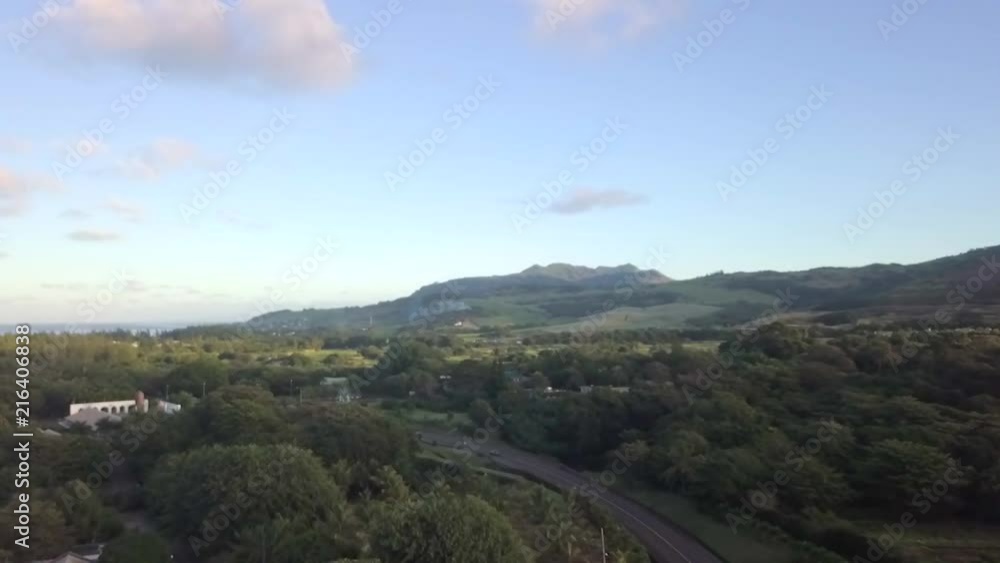 Flying out over the lush landscape to the beach on Mauritius Island. Flying out over the lush landscape to the beach on Mauritius Island.