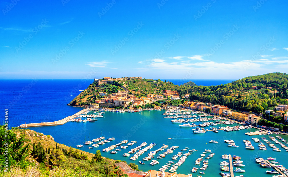 Panoramic aerial view of Porto Ercole town, Monte Argentario, Grosseto, Tuscany, Italy. Architecture and landmark of Porto Ercole and Italy. Tuscany is a region in central Italy