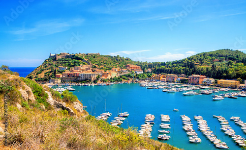 Obraz na płótnie Porto Ercole town, Monte Argentario, in the Province of Grosseto, Tuscany, Italy. Boats in harbor in a sea bay. w salonie