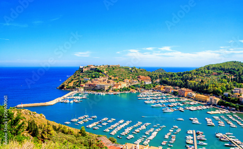 Panoramic aerial view of Porto Ercole town, Monte Argentario, Grosseto, Tuscany, Italy. Architecture and landmark of Porto Ercole and Italy. Tuscany is a region in central Italy photo