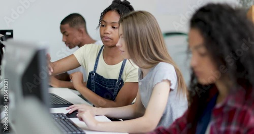Students working together in a computer science class