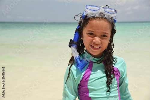 Young girl enjoys the beach in Boracay, Philippines