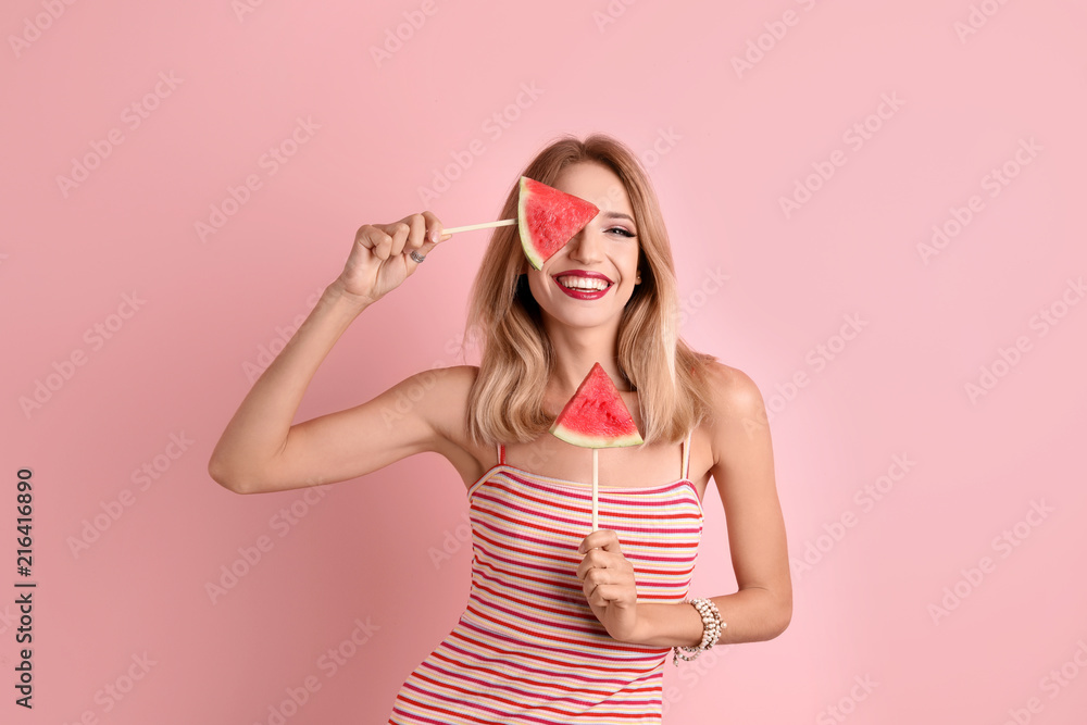 Pretty young woman with juicy watermelon on color background Pretty young woman with juicy watermelon on color background