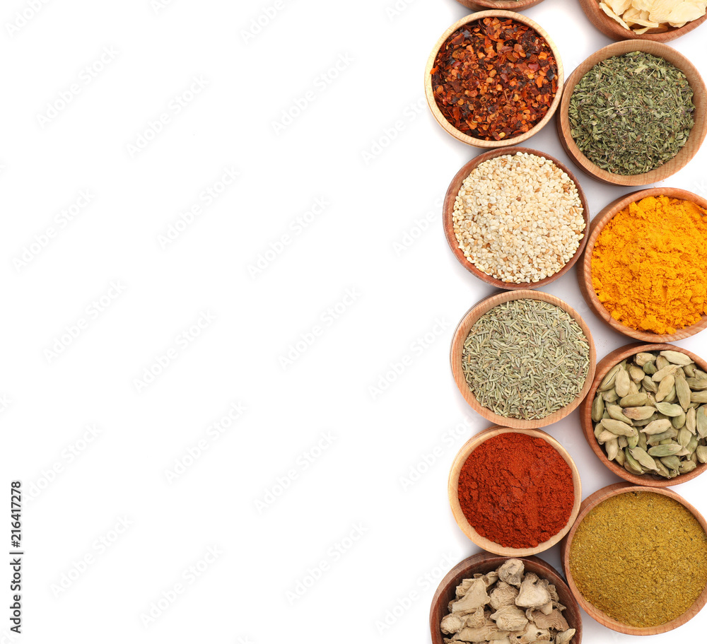 Beautiful composition with different aromatic spices on white background