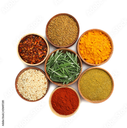 Beautiful composition with different aromatic spices on white background