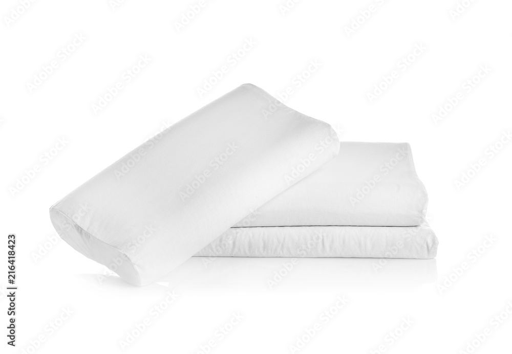 Clean soft orthopedic pillows on white background Clean soft orthopedic pillows on white background