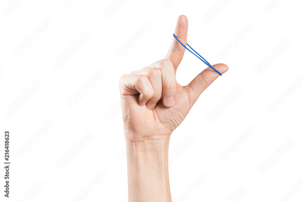 Hand playing with elastic hair band on white background Hand playing with elastic hair band on white background