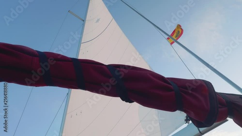 View of Spanish flag hanging on backstay of sailing yacht