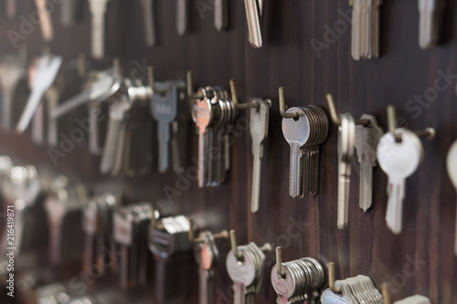 Several Keys type such as household and car key use for copying or duplicating hang on the wall in the locksmith workshop