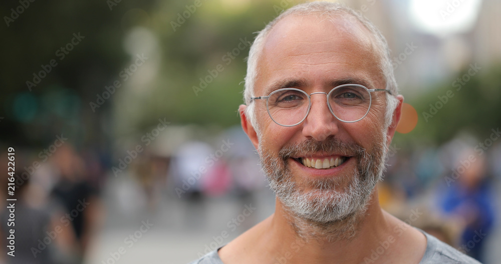 Mature caucasian man in city face portrait Mature caucasian man in city face portrait