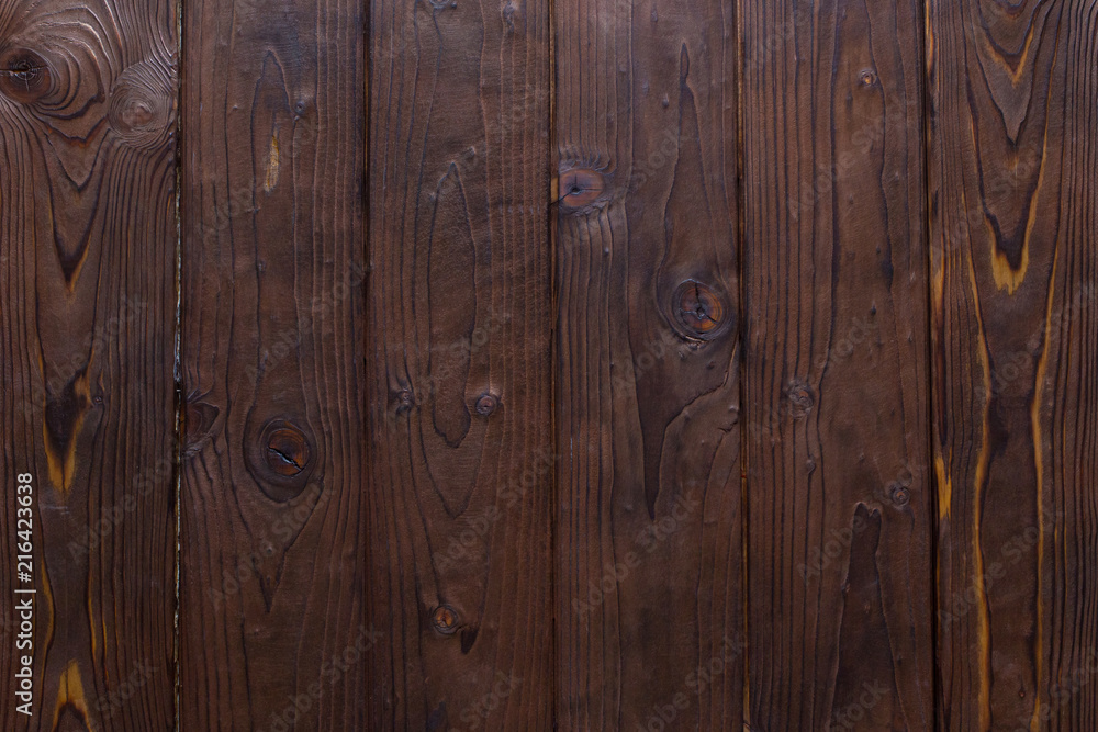 Naklejka premium Texture of dark brown wooden planks