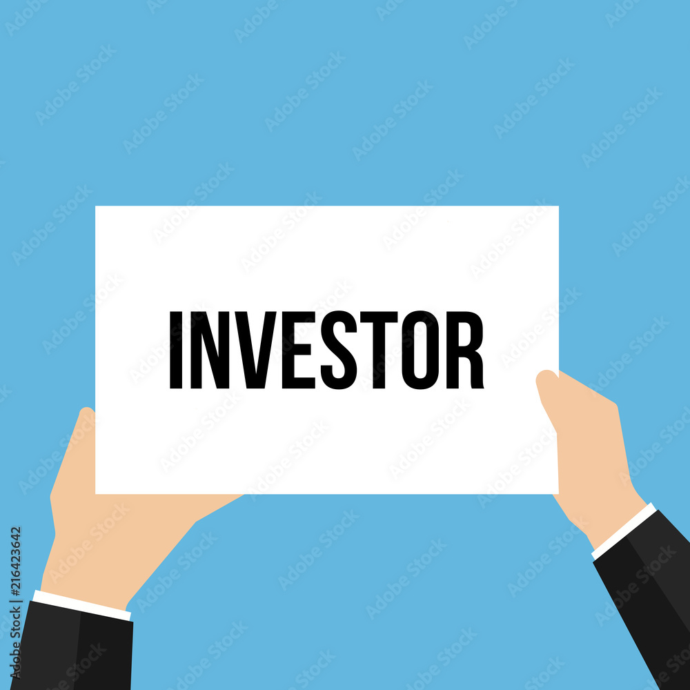 Man showing paper INVESTOR text Man showing paper INVESTOR text