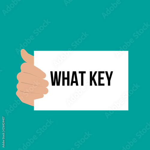 Man showing paper WHAT KEY text
