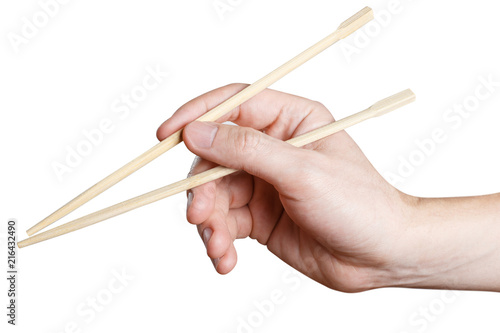 Male hand holding chopsticks, isolated on white background