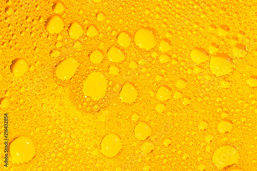golden liquid soap bubbles as background