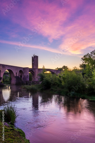 Sunrise at the Medieval bridge of the Besalu (Catalonia, Spain)