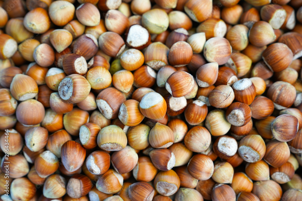 Stack of hazelnuts for sale at a farmer's market, selective focus. Stack of hazelnuts for sale at a farmer's market, selective focus.